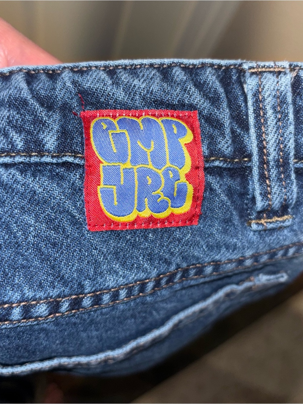 Empyre Men's Blue Denim Jeans with Red and Yellow Patch